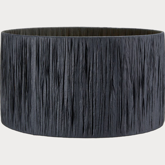 A cylindrical lampshade with black raffia material