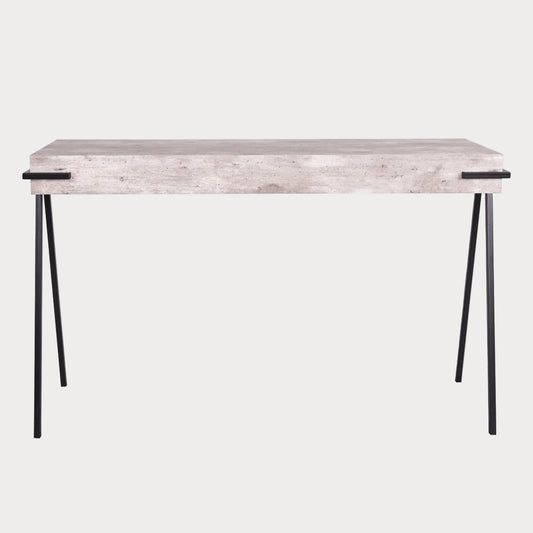 A rectangular console table with a concrete effect top and black angular legs.