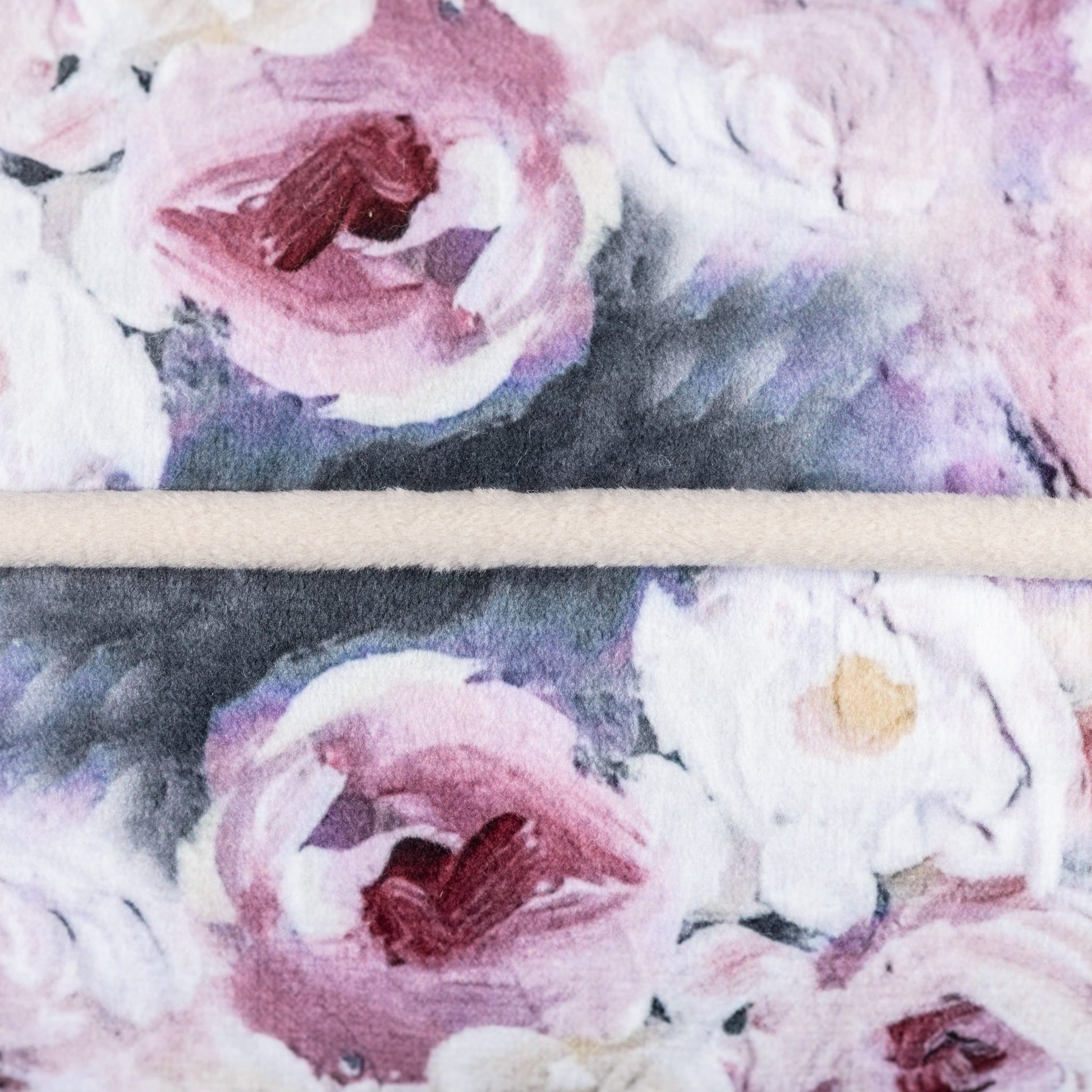 Floral patterned cushion with pink and white flowers