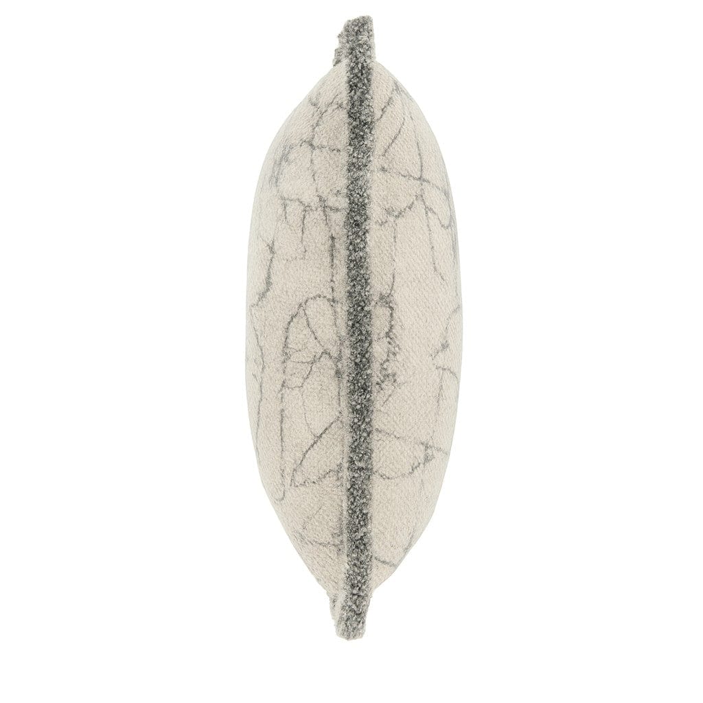 Decorative cushion with a textured surface on a white background