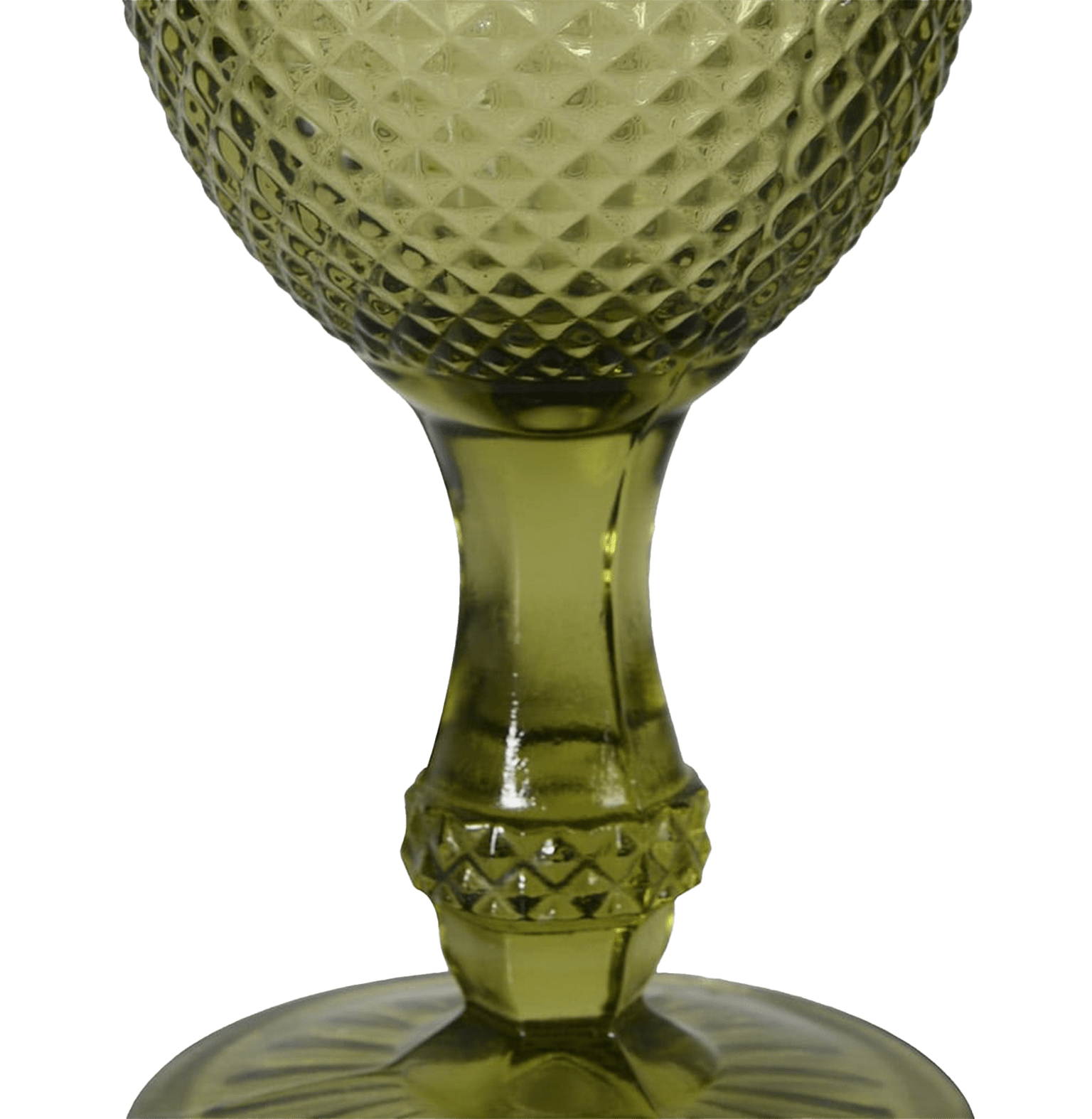 Green glass goblet with textured design on a white background