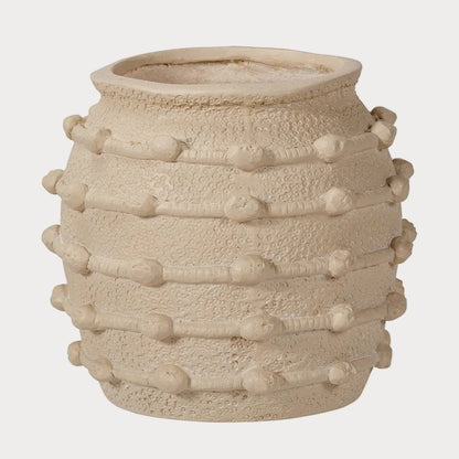 A beige, textured ceramic decorative planter with a geometric bobble design.