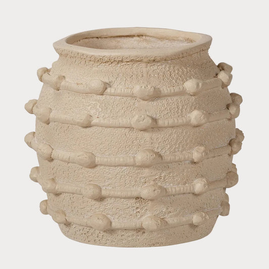 A beige, textured ceramic decorative planter with a geometric bobble design.