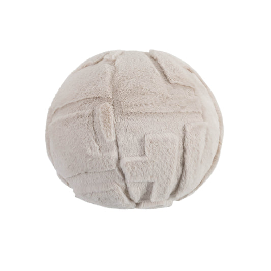 Textured beige cushion ball on a white background
