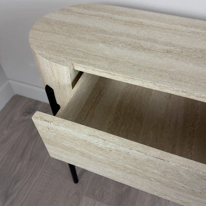 Wooden side table with a drawer open on a wooden floor.