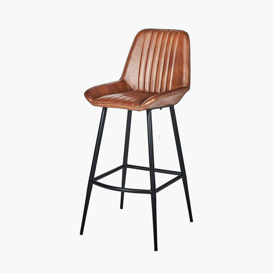 A modern brown vintage leather bar stool with ribbed effect cushioning and black metal legs.