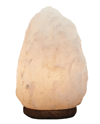Rock-shaped lamp with a warm glow on a white background