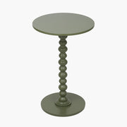 Green round side table with a textured cylindrical base on a white background