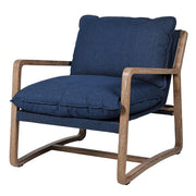 A blue denim armchair with a solid ash wood frame and blended cotton and polyester upholstery.