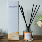 Clyde Candles diffuser with packaging on a wooden surface