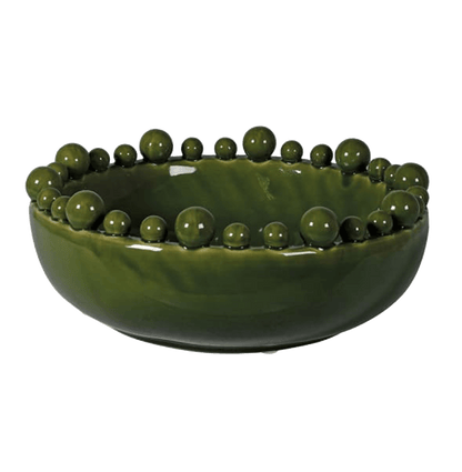 Green ceramic bowl with spherical embellishments on a transparent background