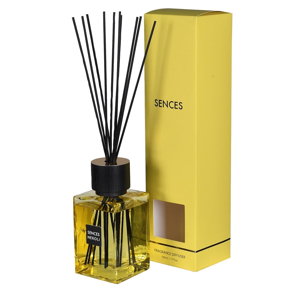 A yellow reed diffuser with black reeds and a yellow box packaging with the brand name SENCES on it.