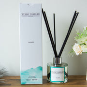 Clyde Candles diffuser with packaging on a wooden surface