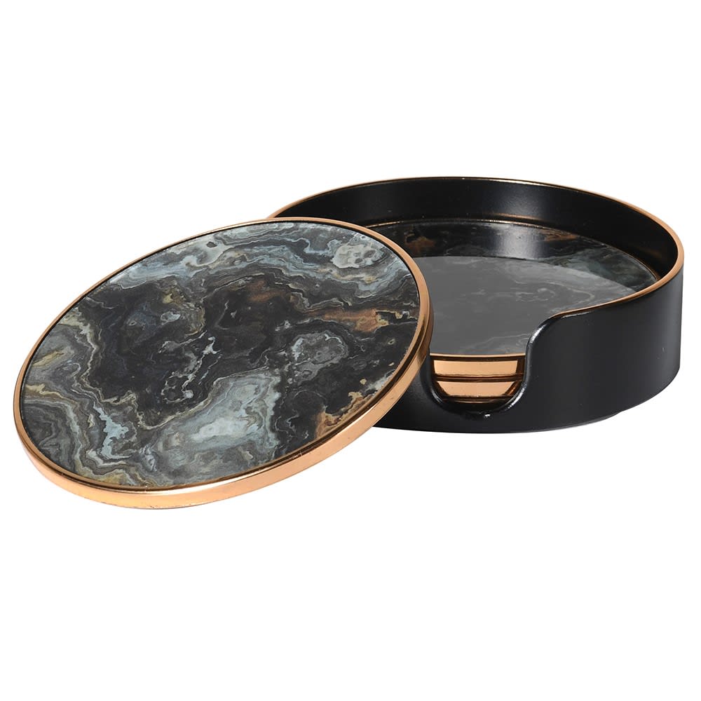 A set of four black marble effect coasters with a golden holder.