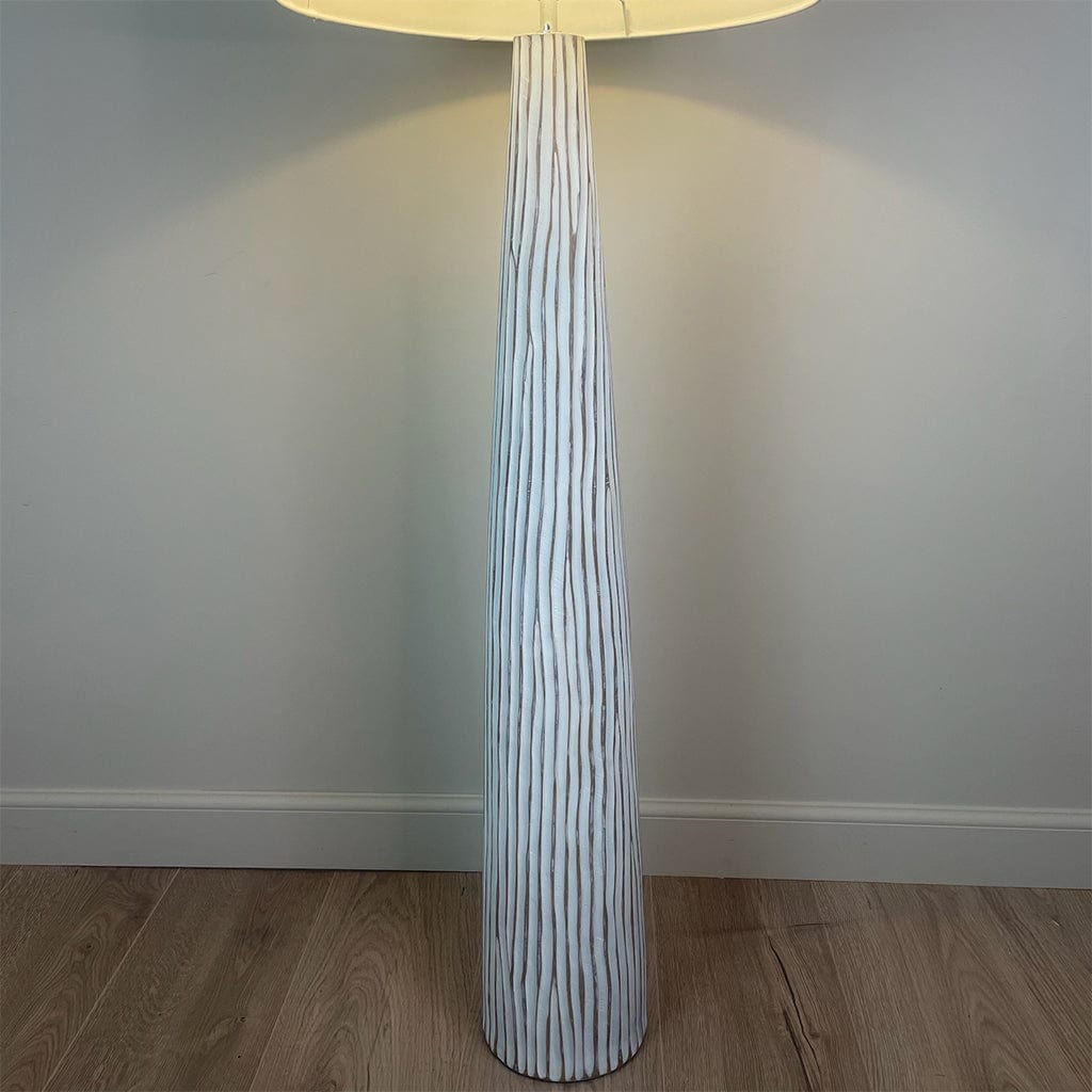 A white wood effect tall floor lamp 